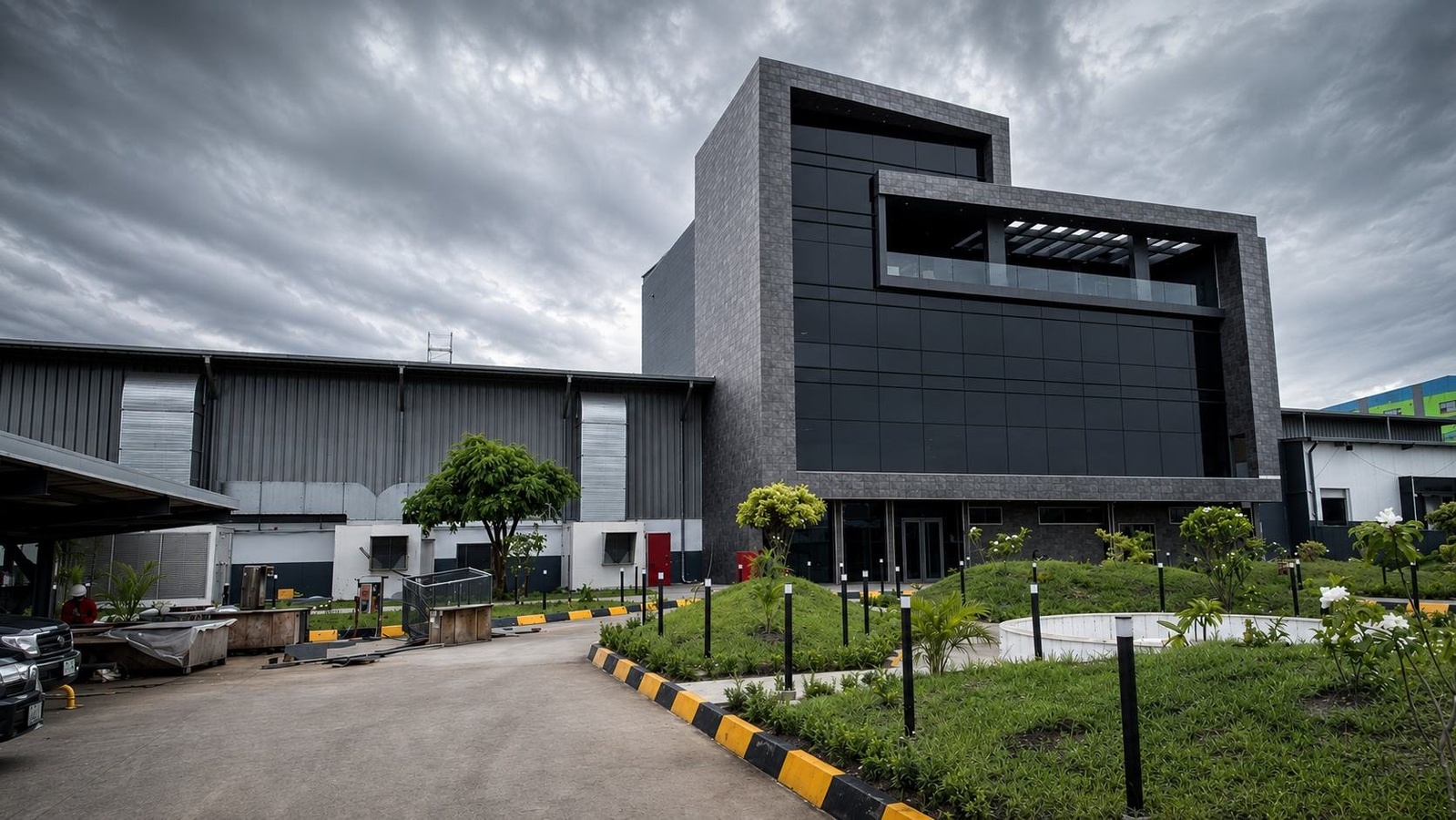 Insignia HQ and Industrial Complex, Lagos, ventilated porcelain facade on a coastal site