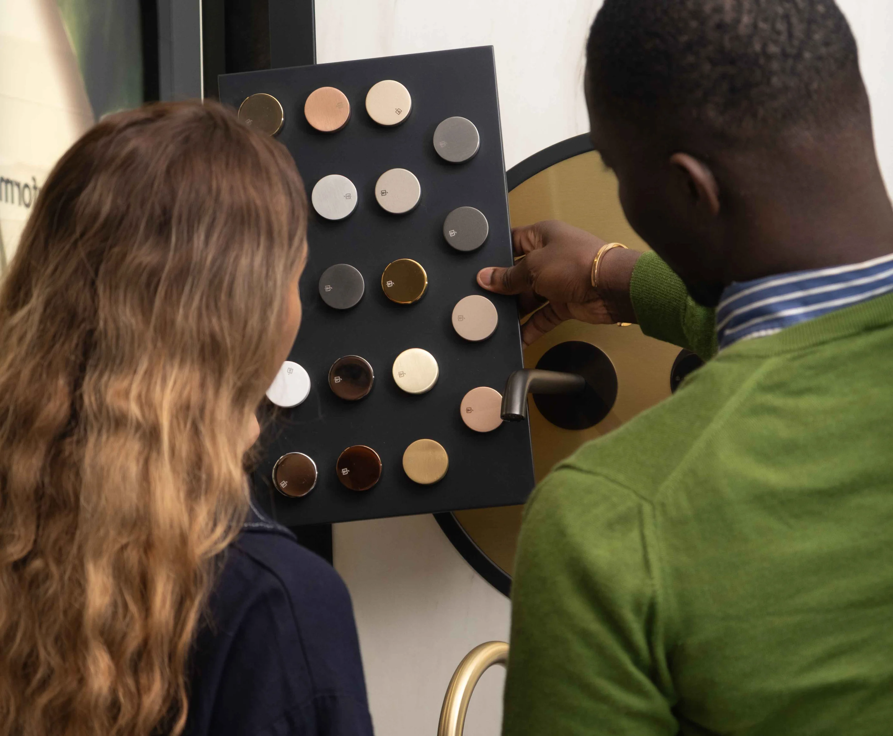 Selecting finishes at a material sample board in the CERAFINI studio